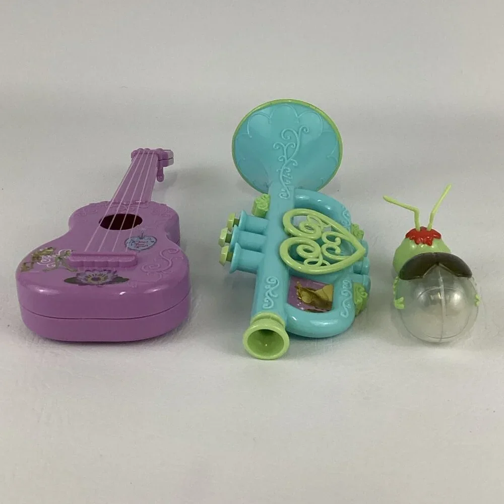 Disney Princess Frog Musical Instrument Lot Trumpet Ukulele Ray Firefly Shaker